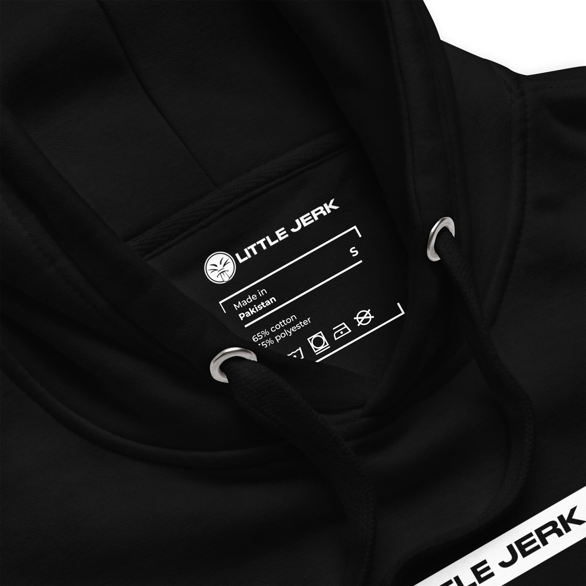 Close-up of a black hoodie showing the label and branding.